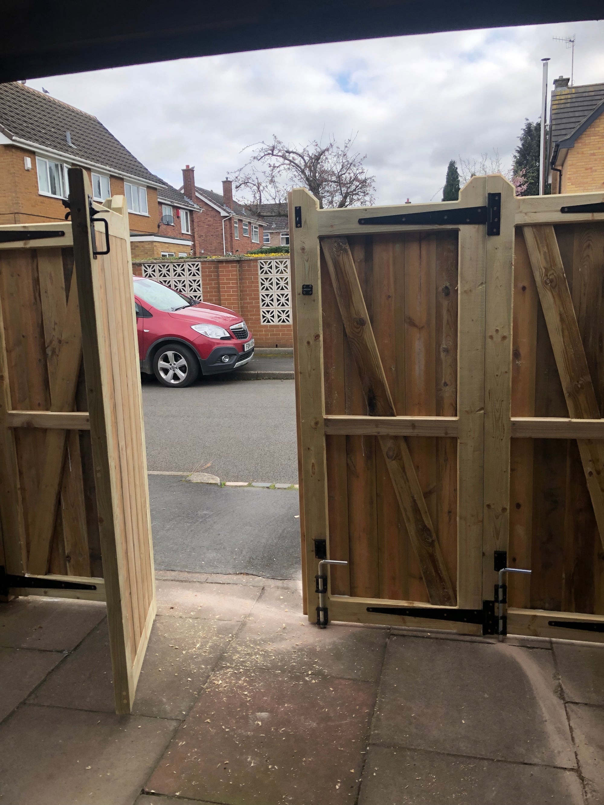 Bi fold wooden outlet driveway gates